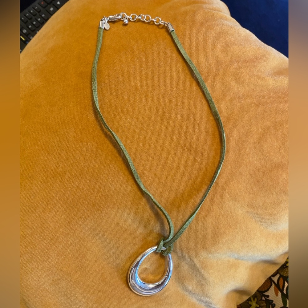 silver charm necklace with leather strap